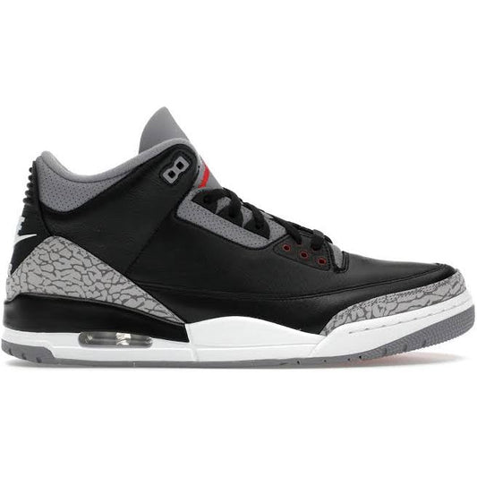 Air Jordan 3 Retro OG Black Cement 2024 sneaker with black leather upper, elephant print detailing, and varsity red accents.